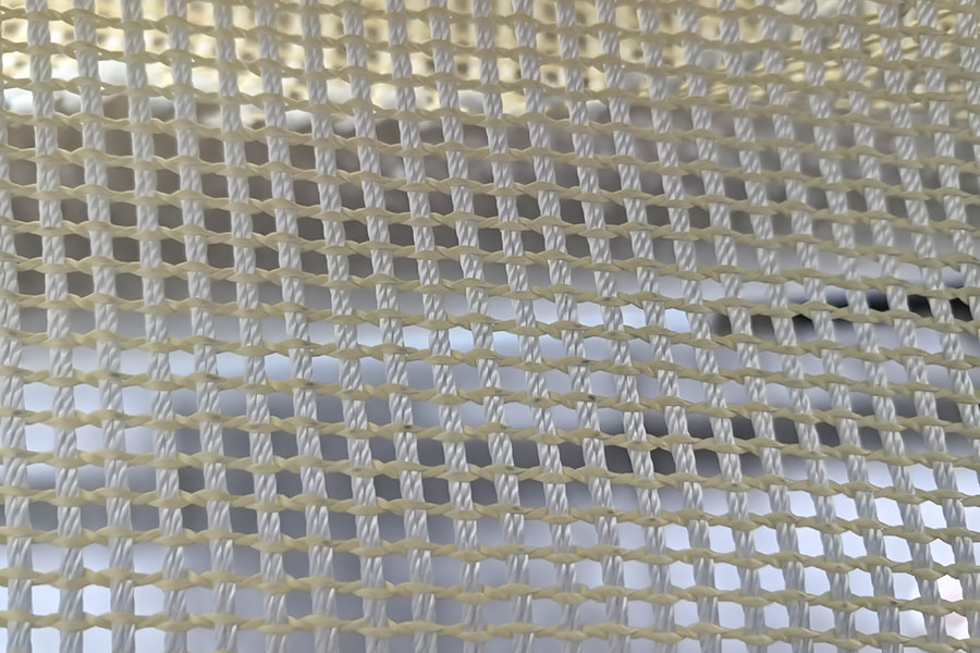 Nagy szilárdságú, aramid erősítésű Mesh Fabric Roll – kompozit alapanyagokhoz