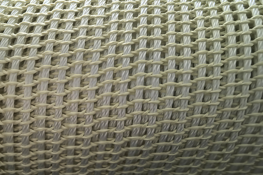 Nagy szilárdságú, aramid erősítésű Mesh Fabric Roll – kompozit alapanyagokhoz